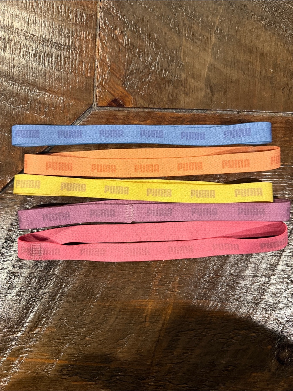 Puma  Stretch Headbands in Blue, Orange, Yellow, Purple, Pink